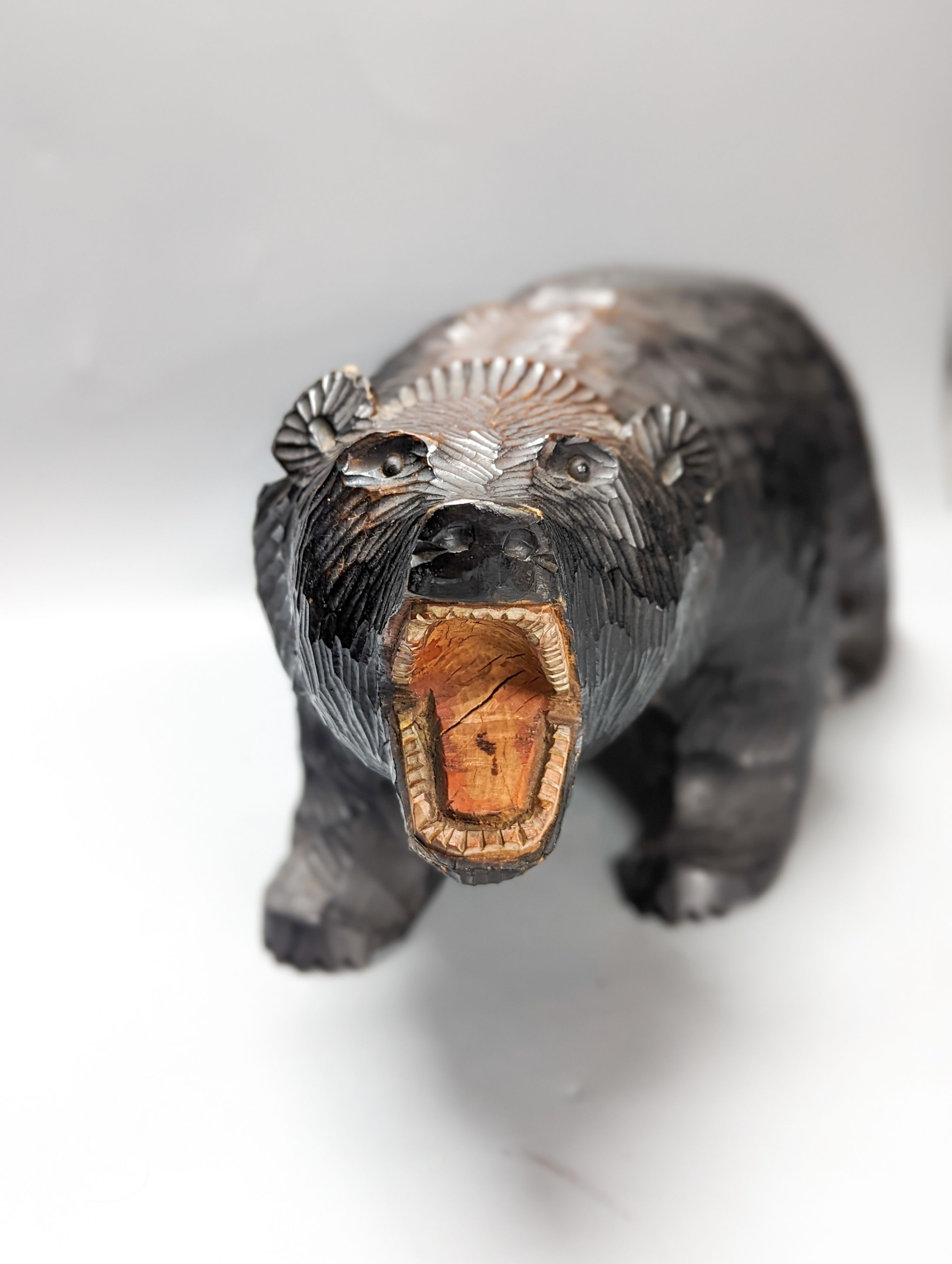 A Black Forest style carved bear 45cm
